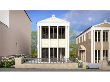 Charming exterior elevation featuring cream paint, large windows, pillars, and a private patio at 225 Rolison Way, Fayetteville, GA 30214
