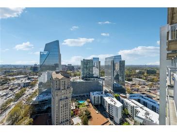 Stunning aerial view showcasing the city skyline and the surrounding urban landscape on a sunny day at 3324 Peachtree Ne Rd # 2808, Atlanta, GA 30326