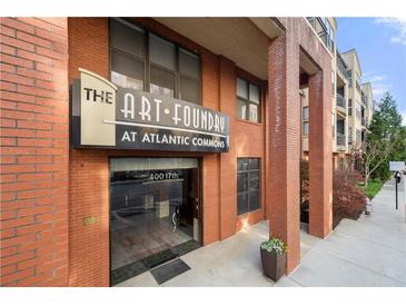Attractive brick building entrance at The Art Foundry at Atlantic Commons at 400 17Th Nw St # 1113, Atlanta, GA 30363