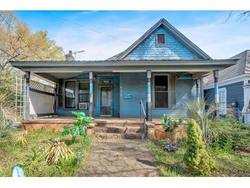 Charming home with a welcoming porch and a garden, offering a cozy curb appeal at 638 Bryan Se St, Atlanta, GA 30312