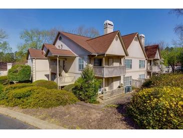 Charming multi-Gathering home featuring private balconies and lush landscaping at 207 Bridge Se Ln, Smyrna, GA 30082