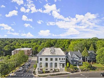 An exterior shot of Park 108 building showcasing a modern design and street view at 108 Park Place Unit 304, Decatur, GA 30030
