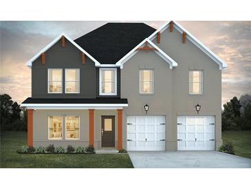 Charming two-story home featuring a two-car garage and welcoming front porch at 218 Orwell Dr, Social Circle, GA 30025