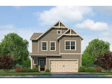 Charming two-story home with attached garage, manicured landscaping, and neutral siding at 1250 Riverstone Rd, Jonesboro, GA 30238