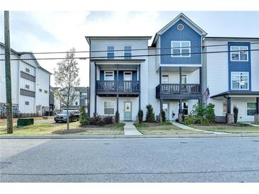 Charming two-story townhomes feature private balconies and well-maintained landscaping at 2225 Nena Way, Tucker, GA 30084