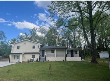 Charming home with lawn and mature trees at 920 James Nw Ct, Marietta, GA 30060