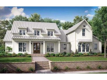 Charming two-story home with white siding and well-manicured lawn at 0 Mcbride Rd, Fayetteville, GA 30215