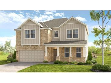 Charming two-story home with a brick and siding exterior and a well-manicured front yard at 5270 Trescott Path, Cumming, GA 30028