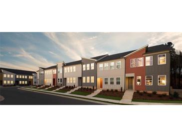 Charming new townhomes in a neighborhood with landscaped front yards and sidewalks, enhancing curb appeal at 1600 Driggs Nw Dr # 162, Atlanta, GA 30318