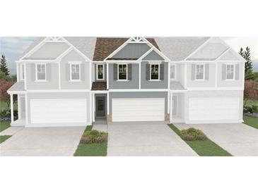 Charming townhome featuring gray siding, inviting entry, and a convenient two-car garage at 6351 Towhee Way, Morrow, GA 30260