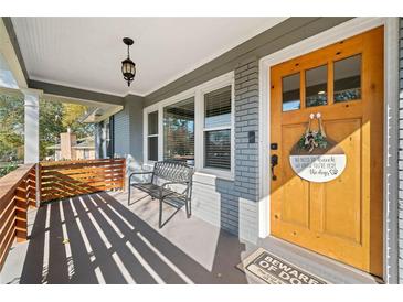 Inviting front porch with seating, decorative door, and stylish accents for a warm welcome at 2742 Oakland Ter, Decatur, GA 30032