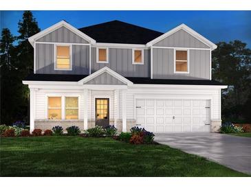 Charming two-story home with white and gray siding, a welcoming front porch, and a manicured lawn at 365 Denali Butte Ter, Canton, GA 30114