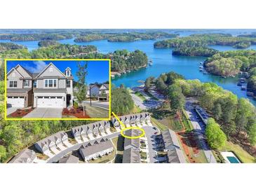 Stunning aerial view of waterfront homes with lake access and lush greenery at 2220 Lanier Harbor Pt, Buford, GA 30518