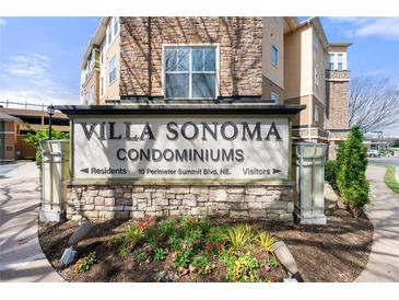Villa Sonoma Condominiums sign with beautiful landscaping and a stone facade at 10 Perimeter Summit Ne Blvd # 2110, Brookhaven, GA 30319