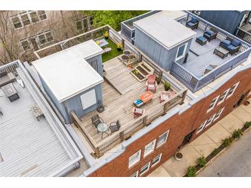 Expansive rooftop deck offers multiple seating areas, raised garden beds, and a unique outdoor living space at 230 Bradberry Sw St # 9, Atlanta, GA 30313