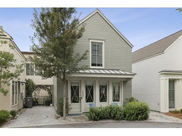 Charming home with a covered entrance, gray siding, and well-maintained landscaping at 530 Bismark Ne Rd, Atlanta, GA 30324
