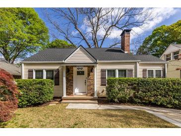 Charming single-story home with a manicured front yard and stone accents around the entrance at 1010 Eden Se Ave, Atlanta, GA 30316