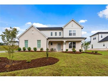 Charming two-story home with landscaped yard at 137 Bastian Rd, Mcdonough, GA 30252