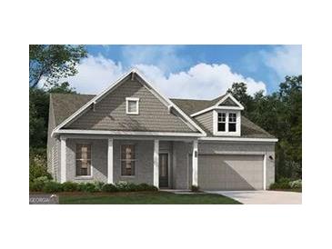 Charming one-story home with gray brick, front porch, and two-car garage at 505 Altamaha Court, Locust Grove, GA 30248
