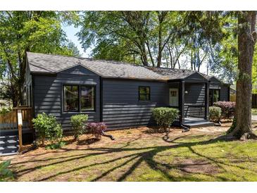 Charming single-story home with a well-maintained front yard and inviting entrance at 1144 Edie Se Ave, Atlanta, GA 30312