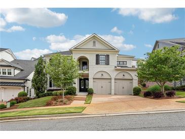 Beautiful, two-story home with a two-car garage and well-manicured lawn at 4025 Connolly Ct, Roswell, GA 30075