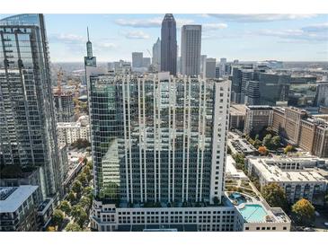 Modern high-rise building with a swimming pool and stunning city views at 860 Peachtree Ne St # 2118, Atlanta, GA 30308
