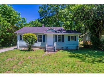 Charming single-story home with a well-maintained front yard and traditional architecture at 4684 City View Dr, Forest Park, GA 30297