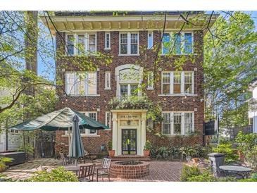 Charming brick multi-Gathering building with a welcoming courtyard and outdoor seating area at 301 10Th Ne St # 3, Atlanta, GA 30309