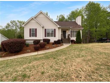 Charming single-story home with well-maintained landscaping and inviting entrance at 131 Diamond Ct, Carrollton, GA 30116