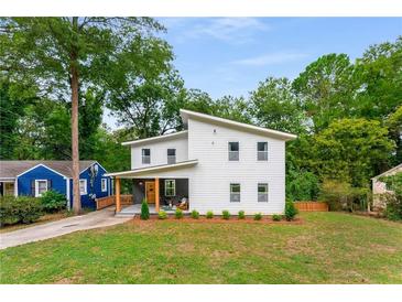 Charming modern two-story home with a well-maintained front yard and welcoming front porch at 1335 Elizabeth Ave Sw, Atlanta, GA 30310