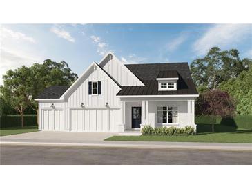 Charming new construction home with white siding, black accents, three-car garage, and manicured lawn at 3547 Cedarvale Ct, Powder Springs, GA 30127