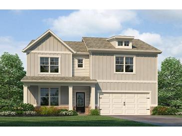 Charming two-story home features vertical siding and a welcoming covered porch at 4517 Ajo Lot#38 Walk, Atlanta, GA 30331