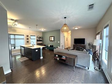 Bright and spacious living room featuring an open floorplan and modern furnishings at 35 Moda Ln, Atlanta, GA 30316