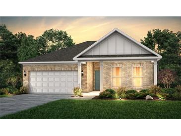 Charming single-story brick home with a two-car garage and manicured lawn at 2108 Amaryllis Dr, Grayson, GA 30017
