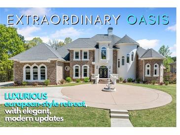 An extraordinary oasis featuring a luxurious European-style retreat with elegant, modern updates and manicured front yard at 1660 Norris Landing Dr, Snellville, GA 30039