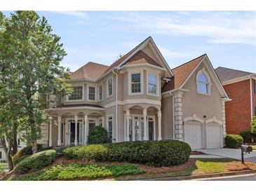 Charming two-story home with landscaped yard and two car garage with lots of natural light at 1105 Westbrooke Ne Way, Brookhaven, GA 30319