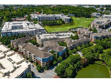 Stunning aerial view of the apartments, lush greenery, golf course and surrounding neighborhood at 400 17Th Nw St # 2125, Atlanta, GA 30363
