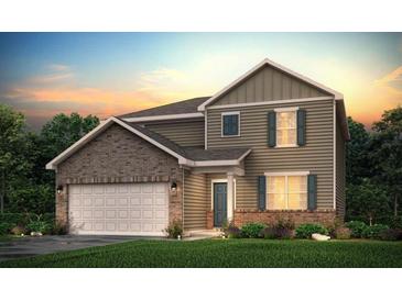Charming two-story home with attached garage, a mix of brick and siding, and a beautifully landscaped front yard at 7224 Lacey Drive- Lot 126, Douglasville, GA 30134