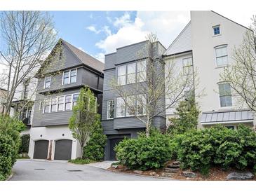 Charming townhomes featuring varied architectural styles and well-maintained landscaping at 588 Bismark Ne Rd, Atlanta, GA 30324