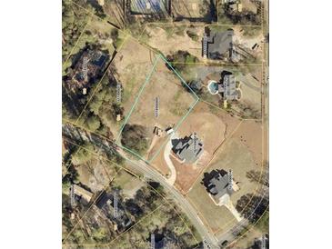 Expansive residential land boasts prime location and neighborhood with nearby homes and community features at 120 Woodlawn Drive, Marietta, GA 30067