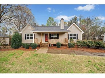Charming single-story home with a cozy front porch and manicured landscaping, creating an inviting curb appeal at 162 Brookhaven Way, Rockmart, GA 30153
