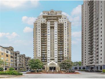 Modern high-rise condo building featuring private balconies and beautiful landscaping at 795 Hammond Dr # 806, Sandy Springs, GA 30328