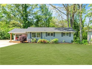Charming single-story home with a well-manicured lawn and inviting front porch at 2793 Horse Shoe Dr, Atlanta, GA 30316