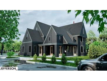 New construction home with neutral colors and traditional architecture at 100 Carlyle Ln, Fayetteville, GA 30214
