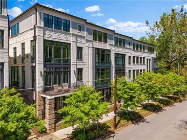 Stunning exterior view of a modern home with beautiful windows and professional landscaping at 1059 Abington Ct, Brookhaven, GA 30319