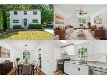 Charming two-story home with a well-maintained lawn and inviting dark front door at 5180 Stone Trce, Stone Mountain, GA 30083