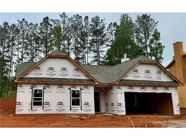 Charming new construction home with a two-car garage and inviting curb appeal, ready for personalization at 486 Charleston Pl, Villa Rica, GA 30180