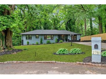Charming single-story home featuring a well-manicured lawn and brick mailbox at 2781 Long Way, Decatur, GA 30032