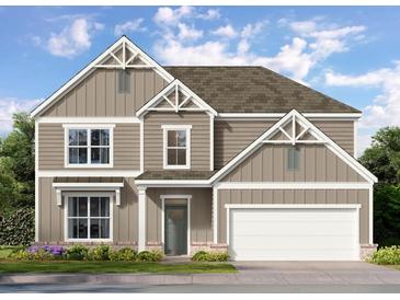 Charming two-story home with a modern facade, complemented by a well-maintained lawn and inviting entrance at 76 Parkview Dr, Dallas, GA 30157