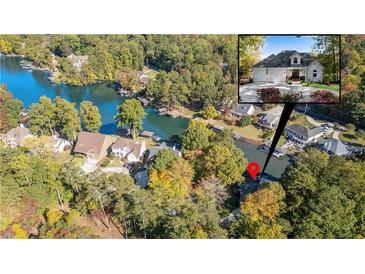 Expansive aerial view of a lakeside home surrounded by colorful fall foliage and docks, plus inset of home's front elevation at 10005 Lakeview Pkwy, Villa Rica, GA 30180